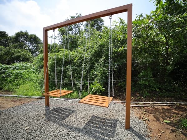 Garden swing in the jungle
