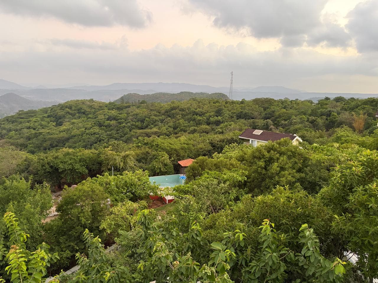Pool overlooking the Sahyadri valley at sunset