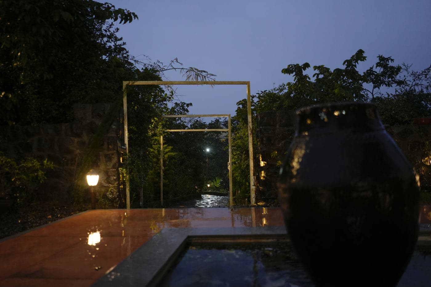 Illuminated walkway after the rain