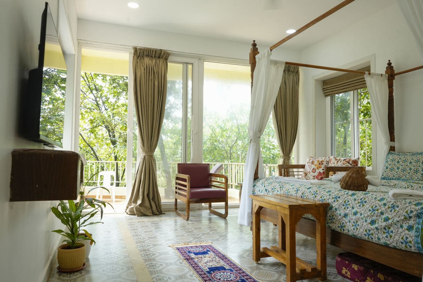 Aranyam Deluxe Room opening onto the forest
