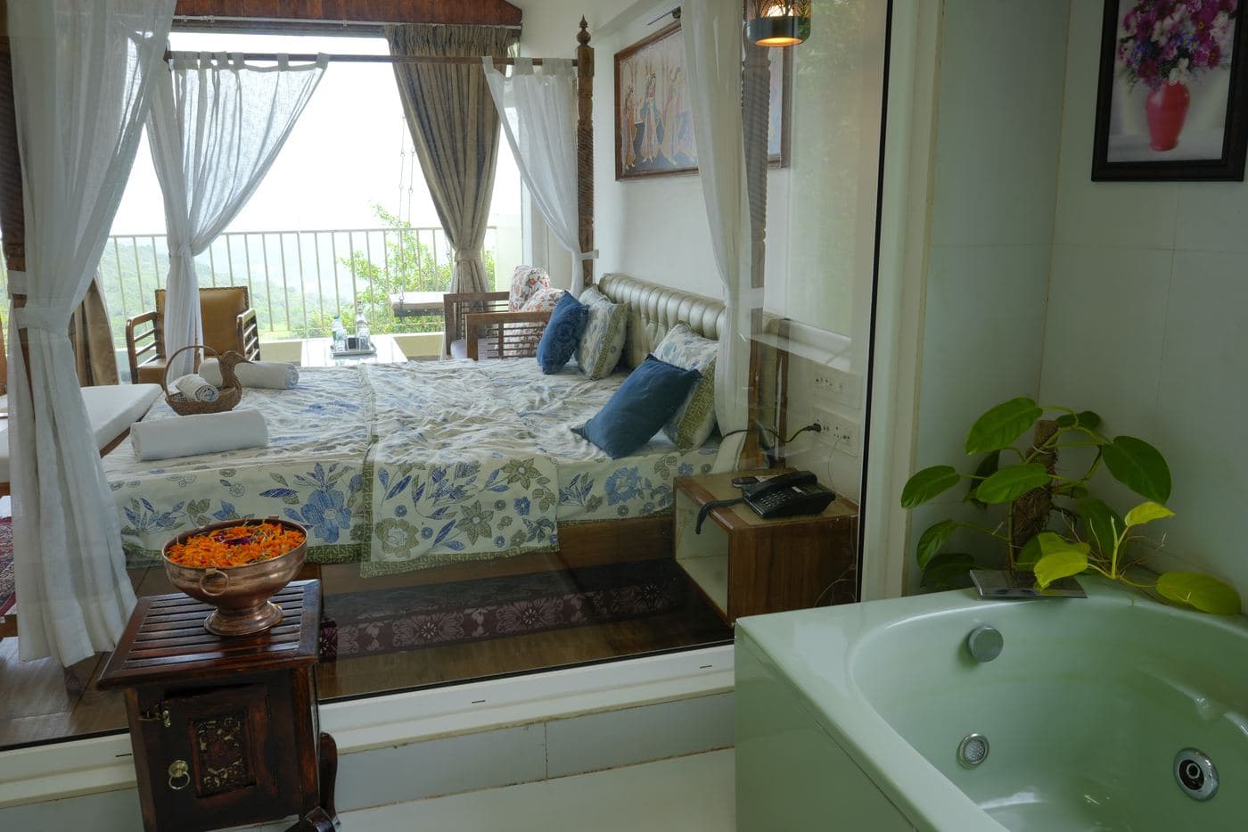 Private jacuzzi beside the bed in the Sahyadri Horizon suite