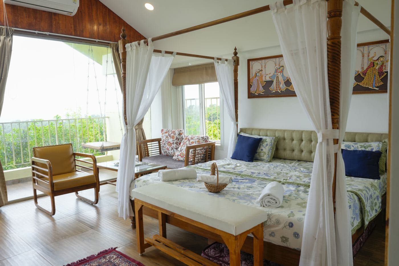 Sahyadri Horizon Premium King Room with canopy bed and valley views