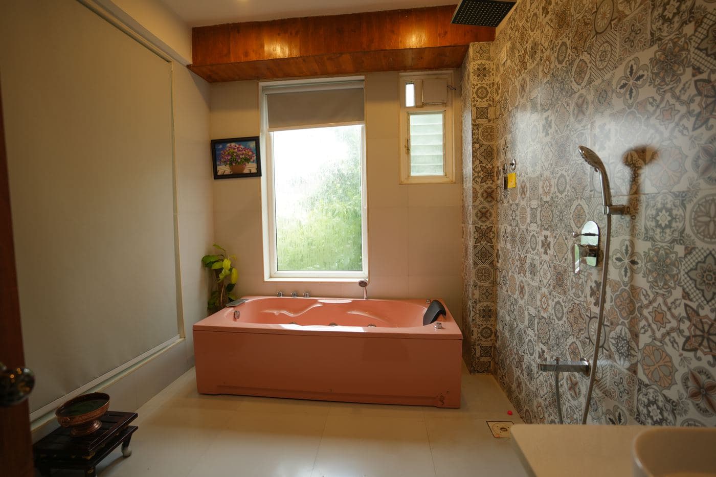 Terracotta soaking tub with a forest outlook